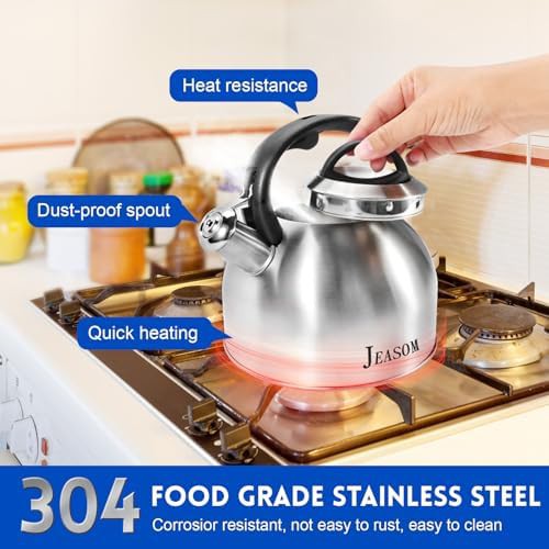 Silver stainless whistling kettle with button control — photo 3