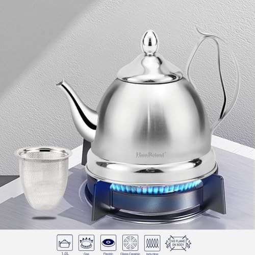 Silver stainless steel kettle with tea infuser — photo 4