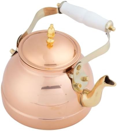 Vintage copper kettle with ceramic handle