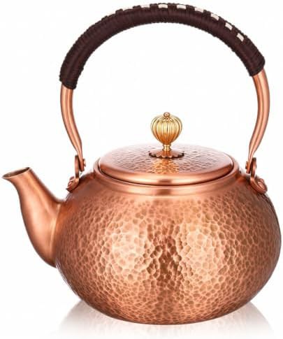 Handmade hammered copper tea kettle